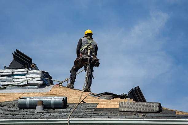 Professional Flat Roof Repair technician working in Six Lakes, MI